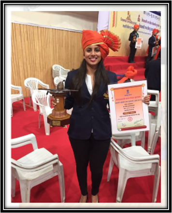 Aditi Dhumatkar receiving Shiv Chhatrapati Award